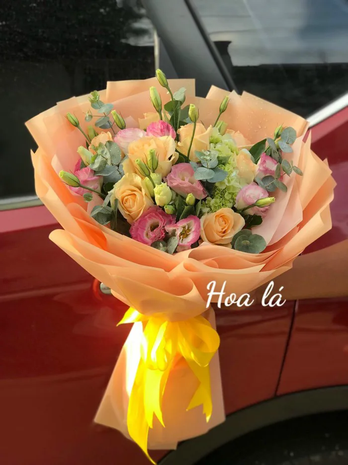 Bó hoa cát tường mix hoa hồng cam